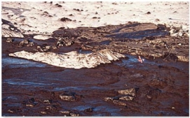 Volcanic eruptions can produce huge floods by: A) melting ice sheets B) erupting huge quantities of water vapor C) displacing water in lakes