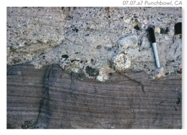 The boundary between these two different sedimentary layers is:   A)  sharp B)  gradational C)  weak