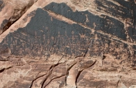 What desert feature is shown in this photograph?   A)  alluvial fan B)  playa C)  caliche D)  desert wash E)  desert varnish