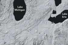 What is the origin of curved ridges R on this figure)  in the Great Lakes area?   A)  folds produced during a continental collision B)  paths of ancient rivers C)  piles of sediment deposited by retreating glaciers D)  remnants of a meteoroid impact