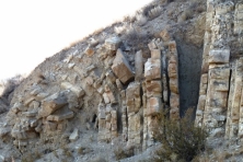 The type of slope failure shown in this photograph is:   A)  creep B)  a rock slide C)  a debris avalanche D)  a debris flow E)  all of these