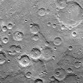 What does this photograph, which is representative of most of Mercury, indicate about the planet?   A)  the surface is covered by impact craters B)  the planet does not have tectonic or volcanic activity C)  the planet lacks wind or water D)  all of these