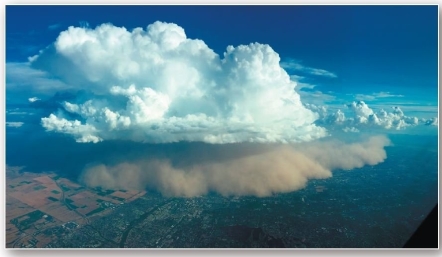 <strong> a()Ground view b()Aerial view Dust storms engulf Phoenix,Arizona,in 2013 (ground view)and 2016 (aerial view). Dust storms,such as one from Arizona in 2013,are caused by downbursts associated with thunderstorms.Such storms are termed</strong> A)playas. B)deflation. C)blowout depression. D)ventifacts. E)haboobs.