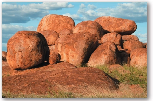   These rounded granite outcrops are the result of which weathering process? A) oxidation B) hydration C) spheroidal weathering D) carbonation E) thermal expansion