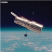 Which kind of telescope is shown and where is it located   A) optical, ground B) radio, space C) radio, ground D) optical, space