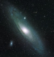   -What is the orientation of the galaxy shown above relative to Earth  A) face-on B) edge-on C) not quite edge-on D) not quite face-on