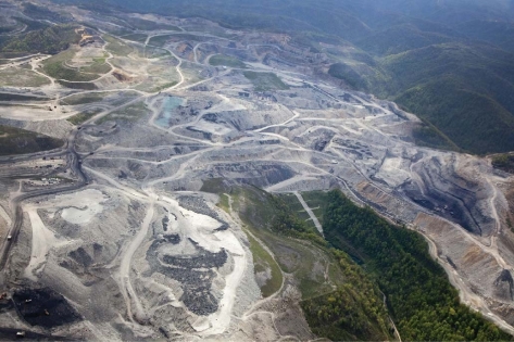   -The region in this photograph represents the results of a process to A) mine coal. B) drill for oil. C) recover natural gas. D) mine uranium for nuclear reactors.