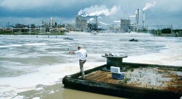 <strong> The hazardous-waste disposal system illustrated in this figure represents</strong> A)a deep-well injection. B)a secure landfill. C)an on-site surface impoundment. D)a best-demonstrated available technology.