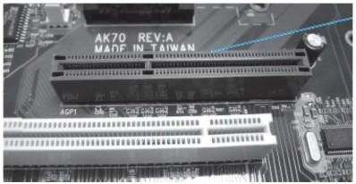   -Consider the figure. The two motherboard components shown are examples of A)  CPUs B)  Chipsets C)  Expansion slots D)  ZIF sockets