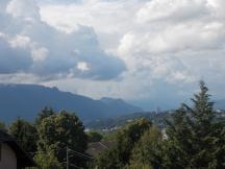 The blueish tinge in the upper portion of the photograph below is indicative of which depth cue?   A) atmospheric perspective B) cloud-based depth cues C) optic flow D) occlusion