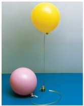 The figure shows two balloons.They are at the same temperature and pressure, and contain equal volumes of gas, but one is floating, and the other is not.The reason for this behavior is that:   A) the balloon that is not floating has the molecules more closely spaced than the other. B) the balloon that is not floating has a gas with a higher molar mass than that of air. C) the balloon that is floating has molecules with more kinetic energy. D) the balloon that is not floating has molecules that have slowed down, since it was filled before the floating balloon. E) the balloon that is floating has a more dense gas than the one that is not floating, so it holds up the balloon better.