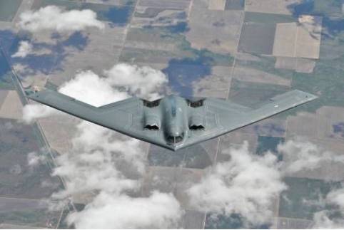 The U.S.Air Force unveiled its new stealth bomber in 1989.   Credit: Staff Sgt.Jeremy M.Wilson/U.S.Air Force -What effect might the creation of planes such as the one pictured have on federal spending? A) New technology led to large increases in the defense budget. B) Federal spending decreased when the nation was better protected. C) The government lowers social spending to make up for higher defense spending.-Consider This: Overall spending increases when one category increases; accommodations are not often made. D) Salaries at the Pentagon decrease as technological costs rise.