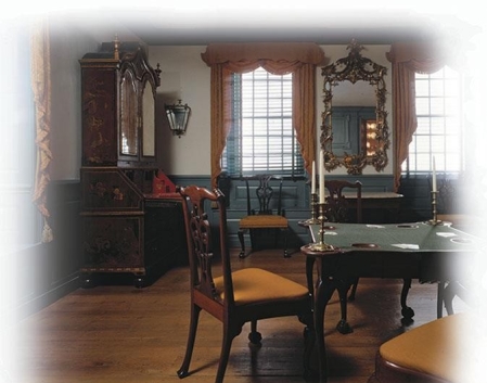   -How did drop-leaf bookcases with writing surfaces such as the one shown on the left side of this image reflect deeper changes in colonial society and economy? A)  New pieces of this type of furniture were symbolic of the expanding trade networks in the British Empire and the growing wealth of the merchant class in the colonies. B)  Writers and poets now had resources to develop a unique American literary style. C)  Furniture with writing surfaces promoted a higher level of educational advancement available to all levels of colonial society. D)  Members of colonial assemblies had greater opportunities to develop local legislation from their homes instead of having to travel to distant cities where the assemblies met.