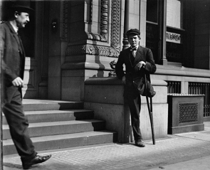 <strong> How did Lewis Hines's investigation of injured Pittsburgh workers that used photographs like this one of a young coal miner amputee help advance Progressive goals?</strong> A) Employers paid immediate hospital expenses for the injured, but then let them fend for their selves. B) Employers established medical practices and hospitals in their company towns. C) States launched worker compensation programs that provided disability payments and medical care to the injured. D) The wealthy instituted private charitable foundations to help injured workers survive.