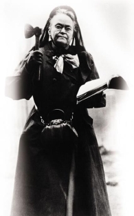   -What type of emotion might saloonkeepers and their clients have felt when they saw prohibitionist Carry A. Nation in costume and with hatchet as she would march into saloons? A)  humor B)  religious devotion C)  fear D)  strength