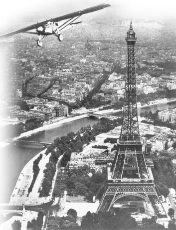 <strong> How would an American traditionalist have best described this 1927 photomontage of Charles Lindbergh's arrival in Paris on the Spirit of St. Louis?</strong> A) Lindbergh's flight illustrated the nation's industrial march forward. B) Lindbergh's flight renewed faith in the benefits of technology. C) Lindbergh exhibited the same adventurous spirit that propelled pioneers across the West. D) Lindbergh demonstrated that individual initiative still mattered in American society.