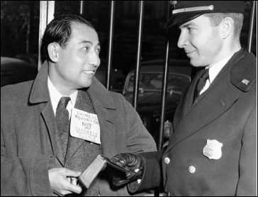   -Why did Life magazine publish this photograph of a reporter with a note identifying him as Chinese instead of Japanese shortly after the start of U.S. involvement in World War II? A)  to instruct Americans in distinguishing between Asian enemies and allies B)  to encourage public violence against Asians and Asian Americans in the United States C)  to show that the Chinese were friendly but that Japanese-Americans supported imperial Japan D)  to promote greater immigration to the United States from China