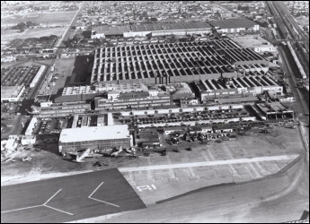       -Defense factories on the West Coast, such as this aircraft factory in Burbank, California, camouflaged their facilities with painted tarps and cardboard houses because they . A)  were secretly developing plans for an atomic bomb B)  did not want the American public to know how much money was being spent on war production C)  wanted to keep their products and locations secret from potential Soviet spies D)  feared a Japanese attack in this region