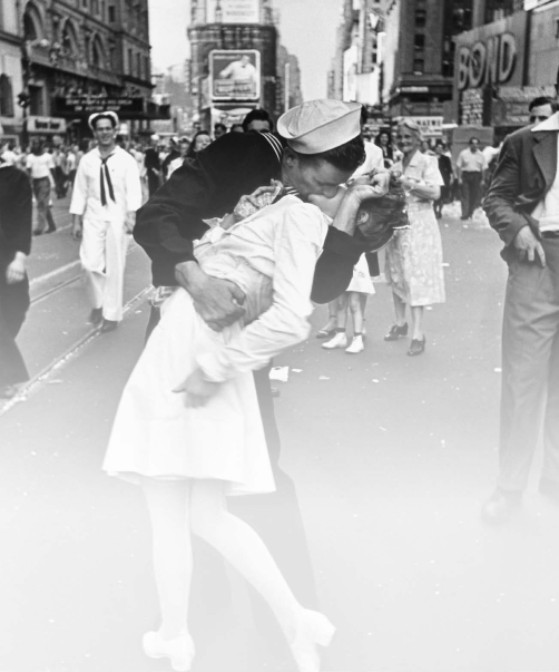   -Why did the Alfred Eisenstaedt photograph  Kiss in Times Square  become an iconic image of World War II? A)  Some see this kiss as an affirmation of life and hopefulness. B)  The photograph appropriately honored the service of the American Navy and war nurses. C)  American morals had become more relaxed as a result of World War II. D)  The kiss was a symbol of the global reunification and harmony that took place after the war.