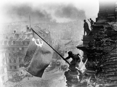   -How does this photograph of a Russian soldier waving the Soviet flag from the roof of the German Reichstag above the ruins of Berlin address one of Soviet dictator Joseph Stalin's postwar goals? A)  Stalin wanted to help Germany reestablish itself as a powerful military state. B)  Stalin believed that opening Germany to free markets would bring it closer to the USSR. C)  Stalin feared future German invasions and set up puppet states in Eastern Europe to protect the USSR's borders. D)  Stalin favored reconciliation with Germany now that it had been defeated in World War II.