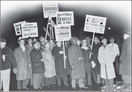   -This 1946 photograph of striking steel workers demonstrates that the . A)  strikers were focused on shortening the work week B)  strikers did not support returning U.S. veterans C)  labor movement had become more integrated D)  labor movement had been infiltrated by communists