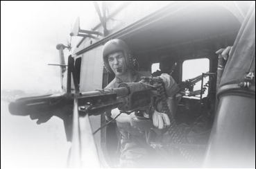    -What message do the snapshots  Reaching Out  on the left and of gunner James Farley on the right, which were both taken by Life magazine photographer Larry Burrows, convey to the public about the Vietnam War? A)  Both younger and older soldiers were participants in combat. B)  American military combat was a shared burden as well as an individual experience. C)  Combat produced both doubts and idealism in American soldiers. D)  Combat resulted in both cowardice and bravery.