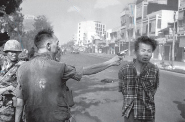 <strong> What did Associated Press photographer Eddie Adams mean when he commented on his snapshot Saigon Execution by stating that pictures do not always tell the full story, and this is one case where this is true?</strong> A) The photograph intended to draw on American sympathies for the execution of an innocent civilian, but it actually revealed that this person was an armed Communist guerrilla. B) This photograph was meant to show that Saigon was under law and order, but it instead portrayed a city in the midst of chaos. C) This photograph tried to show support for South Vietnamese General Nguyen Ngoc Loan's action for executing an armed Vietcong terrorist, but it was actually condemned by Americans as a cold-blooded execution. D) The photograph was meant to condemn General Loan's vicious regime in Saigon, but Americans instead saw him as a hero fighting against communism.