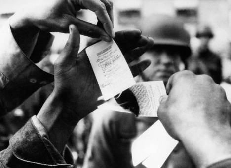 <strong> Why did many male American antiwar protestors choose to burn their draft cards during the Vietnam War?</strong> A) They supported a communist-run government in Vietnam. B) They believed they were intentionally committing treason against the United States. C) They saw this action as a form of free speech against the war. D) The Supreme Court had legalized burning draft cards as free speech.