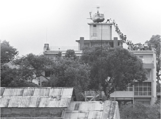 <strong> What feeling can be inferred from the photo of the South Vietnamese attempting to flee Saigon from the roof of the American Embassy in 1975?</strong> A) security because the South Vietnamese were not in imminent danger B) satisfaction because the evacuation was a triumph for the United States C) disdain because Americans were not eager to help their Vietnamese allies D) disheartenment because many of those in line would not be able to escape