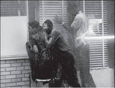<strong> Why did civil rights activists in Birmingham approve the media's use of such violent pictures taken by Life photojournalist Charles Moore that depicted the mistreatment of women and young people during the Birmingham campaign of April 1963?</strong> A) They wanted Northerners in particular to be outraged at the display of police brutality. B) They were trying to persuade President Kennedy to send in federal troops for their protection. C) They sought to condemn the Ku Klux Klan for participating in these violent actions. D) They wanted to convince the public that they had no choice but to resort to violence in order to achieve desegregation.
