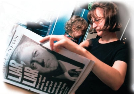   -Based on the newspaper in the photograph, it can be concluded that Bill Clinton was impeached by the House of Representatives for . A)  denying he had an affair while testifying under oath on an unrelated matter B)  having an affair with White House intern Monica Lewinsky C)  deceiving the American public on television about his relationship with Lewinsky D)  having sexual relationships with multiple women after he was married