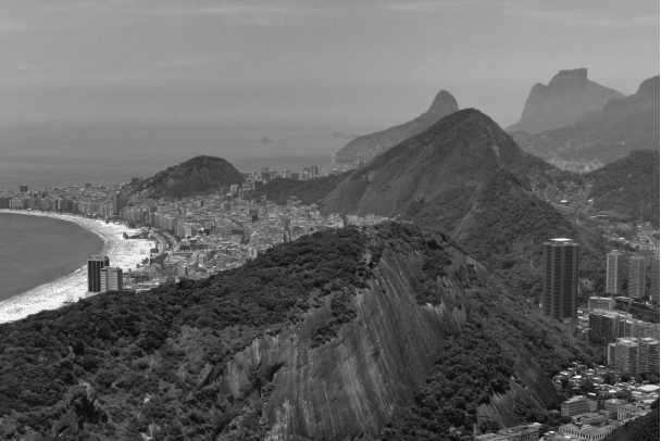 The mountains around Rio de Janeiro shown in the below image represent a landscape with   A)  subsidence. B)  no erosion. C)  low relief. D)  high relief.