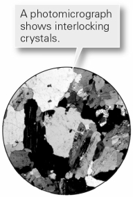 What type of texture is shown in this photomicrograph?   A)  foliation B)  crystalline C)  sedimentary D)  clastic
