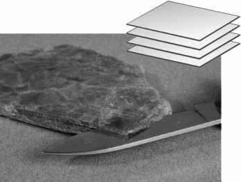 The image below shows a mineral specimen of mica.How many planes of cleavage does mica possess?   A)  one B)  two C)  three D)  many