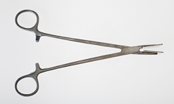 Figure 10-78 A   -Identify the instrument pictured above and state two uses for it.