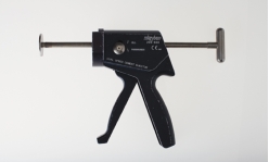 Figure 07-55 A   -Identify the instrument pictured above. A)  Cement mixer B)  Cement gun C)  Tamp D)  Drill