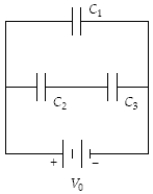 What is the potential difference across C<sub>2</sub> when C<sub>1</sub> = 5.0 μF, C<sub>2</sub> = 15 μF, C<sub>3</sub> = 30 μF, and V<sub>0</sub> = 24 V?   A)  21 V B)  19 V C)  16 V D)  24 V E)  8.0 V
