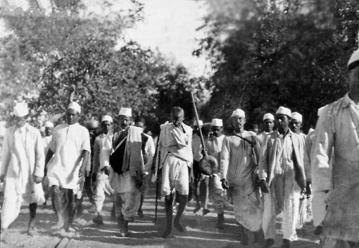 Use the image below and your knowledge of world history to answer all parts of the question that follows.   Mahatma Gandhi Salt March in progress, March 12, 1930 (A) Identify ONE way that nationalist parties and leaders in Asia challenged imperial rule. (B) Explain ONE way imperial powers responded to nationalist pro-independence movements. (C) Identify and explain ONE limitation of using the image above as an example of the way that nationalist parties and leaders in Asia and Africa challenged imperial rule.