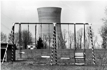 <strong>The photo Three Mile Island Nuclear Plan, 1979 shows part of the nuclear power plant outside Harrisburg, Pennsylvania, behind an empty swing-set. What conclusions can you draw from this image? </strong> A) Local residents and governments had previously felt safe around nuclear power. B) City planners had not considered how unattractive a nuclear reactor would be. C) The neighborhood around the nuclear reactor had already been suffering from blight. D) The neighborhood around the nuclear reactor had been predominantly black.