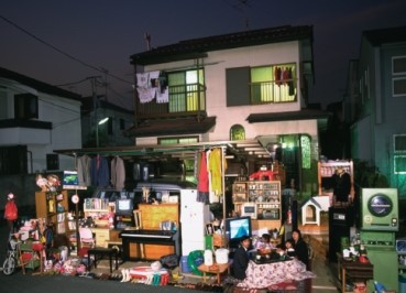 Which of the following represents consumption overpopulation?   A typical Brazilian Residence   A typical Japanese family   A typical Mexican family   A typical family from Mali A) Family from Mexico B) Family from Mali C) Family from Japan D) Family from Brazil