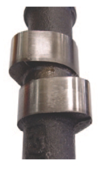 The cam lobes in the photograph shown here are for the number one cylinder and its companion on an in-line pushrod engine that rotates counterclockwise when viewed from the rear. The lobes are positioned:   A) At TDC at the beginning of the compression stroke B) At TDC at the beginning of the intake stroke C) None of the above