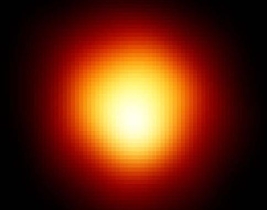 The figure shows an HST image of the red giant star, Betelgeuse. In the red giant stage, hydrogen is being fused to helium   A)  on the surface of the star. B)  in the center of the star's helium core. C)  on the outside of the star's helium core. D)  Neither helium nor hydrogen is being fused in the red giant stage.