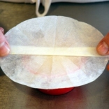 What cooking method is this being prepared for?   A)  Boiling B)  Deep poaching C)  Steaming D)  Shallow poaching