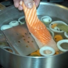 What is the name of the cooking liquid for poaching salmon?   A)  Fish bouillon B)  Court bouillon C)  Fish stock D)  Salmon stock