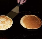 What are these drop scones best cooked in or on?   A)  A bratt pan B)  A griddle C)  A frying pan D)  A grill