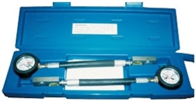 <strong>What is the purpose of the tool kit shown in this picture?  </strong> A)Measuring brake application pressure B)Runout gauges C)Engine compression testing D)Tire pressure gauges <div style=padding-top: 35px> 