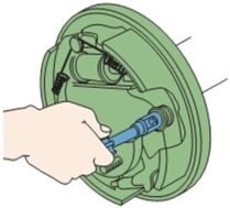 <strong>What is the technician doing in this illustration?  </strong> A)Hold down spring removal/replacement B)Shoe clearance adjustment C)Shoe return spring adjustment D)Unbolting the shoe retainer <div style=padding-top: 35px> 