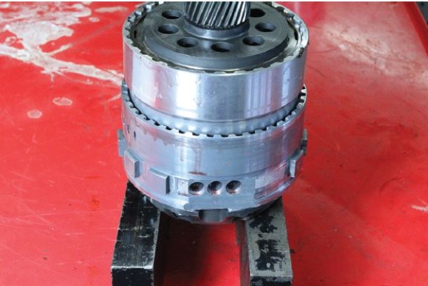 Identify the component of 62TE transmission shown in the given figure   A)  Variable force solenoid B)  Transmission case C)  Hex-style plug D)  Transfer shaft