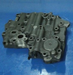 Identify the component shown in the given figure.   A)  Cast iron valve body B)  Aluminum valve body C)  Steel valve body D)  Nickel coated valve body