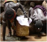 What are these children doing to prevent guinea-worm disease infections?   